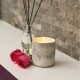 Vela aromática con contenedor de cerámica