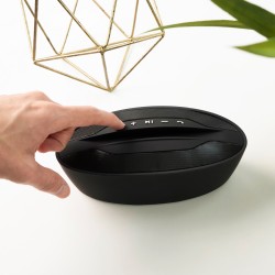 Bocina portátil con porta celular